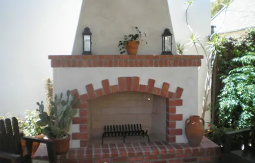Outdoor Stucco Fireplace Installation